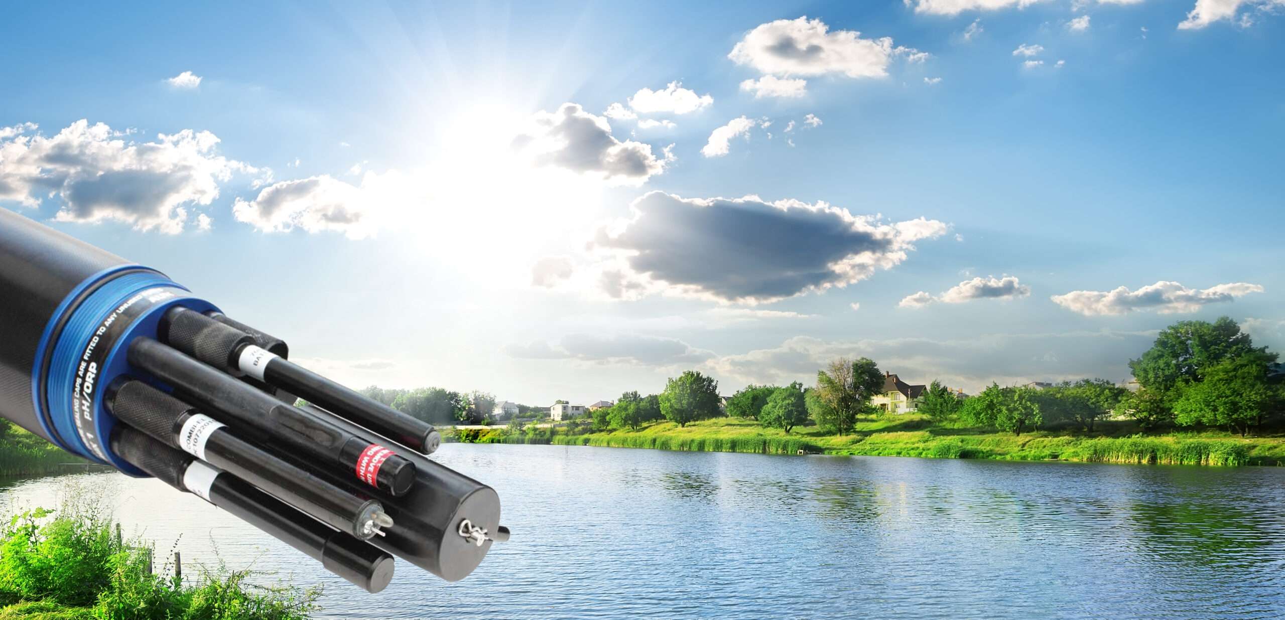 Sun over calm river in the spring morning
