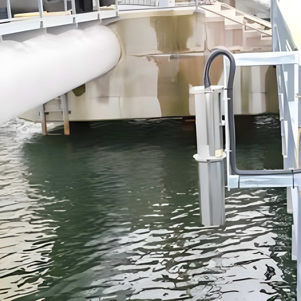 Oil spill sensor mounted above water surface near an industrial facility, designed for real-time detection of oil contamination and hydrocarbon spills in water monitoring applications.