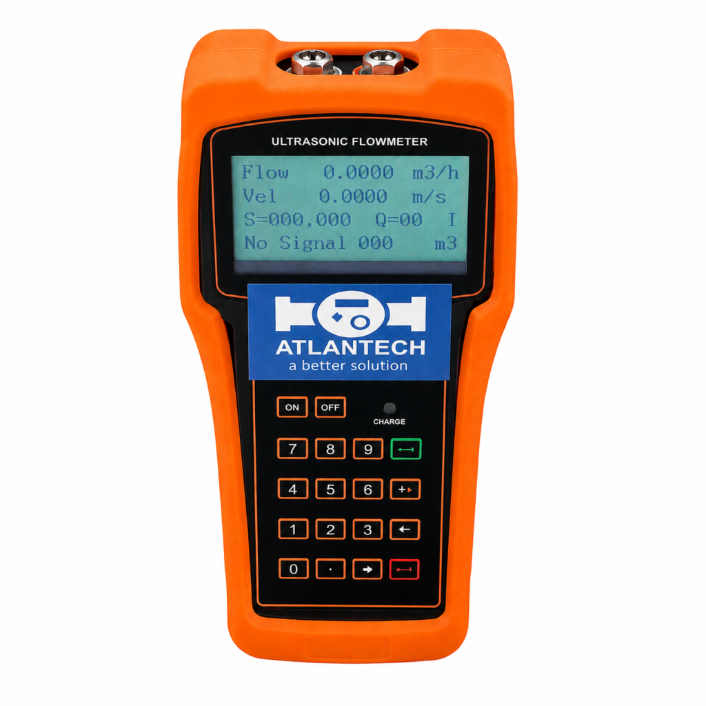 Portable Atlantech ultrasonic flow meter handheld device with a digital LCD display, numeric keypad, and rugged orange housing, designed for non-invasive flow measurement and field testing applications.